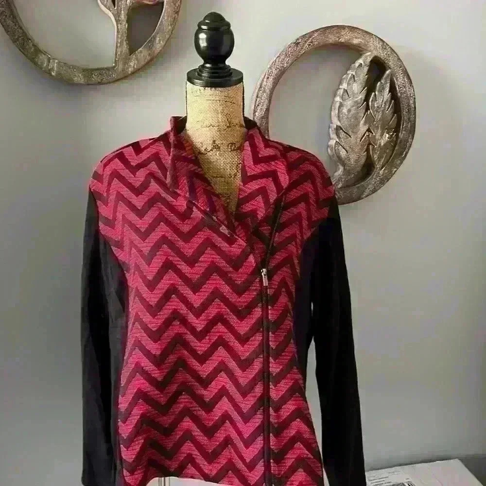 Chicos size 3 jacket . Black material is stretchy